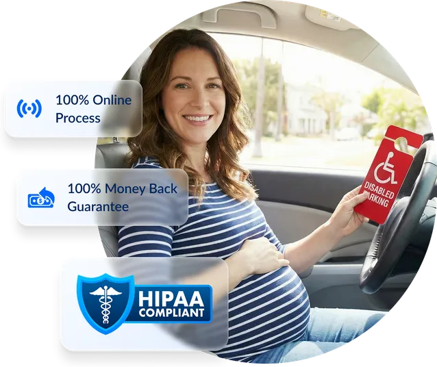 Expectant mother in a car holding a disability parking placard